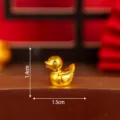 Gold electroplated resin little yellow duck figurine, DIY craft accessory desktop ornament. - Electroplated Gold