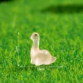 Mini statuetta dinosauro in resina, simpatico ornamento da scrivania, decorazione 2x1.8cm. - Brachiosauro Arancione Lucido