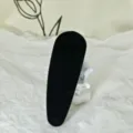 Black flocked teardrop hair clip for daily styling, elegant and minimalist hair accessory. - Flocked Waterdrop Black