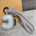 Leather letter keychain with braided strap, stylish dopamine bag pendant for daily use. - Letter J