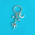 Dettaglio del ciondolo per portachiavi con stella e luna in lega di argento per borse. - Stile Stella a Quattro Punte Luna (5#) / Argento