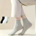 Comfortable casual solid color crew socks for men and women, breathable daily wear. - Classic Plain Crew Socks / Gray