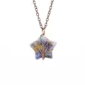 Detail view of a stunning crystal star pendant necklace with delicate copper wire tree of life. - Antique Copper + Lapis Lazuli