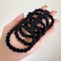 Black braided hair ties for women with cute smiley face detail, high elasticity rubber bands. - Black (Single)