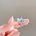 Pince à cheveux nœud en zircone pour femme, barrette élégante et brillante pour un look chic. - Nœud pour cheveux