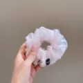 Pink organza scrunchie hair tie, shiny sheer fabric hair accessory for elegant daily styling. - Pink