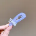 Purple crushed diamond pearl bow hair clip detail view, elegant crystal side hairpin for women. - Bowknot Waterdrop / Light Purple