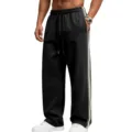 Detailed shot of men's wide-leg sweatpants featuring contrast side stripes and drawstring. - S / Bottoms / Black