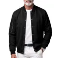 Men's faux suede bomber jacket, baseball collar, snap button closure, ribbed cuffs and hem. - Black