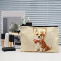 Detailed view of cute corgi canvas zipper cosmetic bag, featuring lovely dog illustration. - Cute Corgi