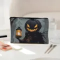 Detailed view of Halloween canvas makeup pouch featuring spooky pumpkin lantern print design. - 04 (Halloween Pumpkin Light)