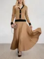 Ensemble gilet en tricot et jupe plissée femme, vue de détail automne élégante. - Kaki