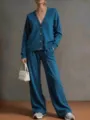 Detailed view of the stylish autumn solid color V-neck cardigan and loose wide-leg pants set. - Teal