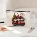 Gros-plan de la trousse de maquillage en toile de Noël avec camion rouge et fermeture éclair solide. - Style Gnomes de Noël