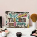 Detailed close-up of teacher cosmetic bag with pencil print and zipper closure on desk. - Best Teacher Style (03) / Off White
