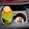 Car cup holder coaster detail showcasing vintage rocking chair patchwork quilt print design. - 7cm05
