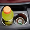 Christmas car cup coaster detail view, showing the festive wreath design inside a vehicle holder. - Christmas Wreath (7cm03) / 01