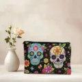 Close-up detail of the colorful sugar skull printed cosmetic bag, showing vibrant floral patterns. - Skull Style