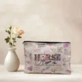 Detailed view of the cute nurse themed cosmetic bag, showcasing pink medical prints and black zipper. - Style 05