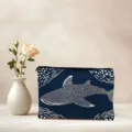 Close up detail of blue canvas cosmetic makeup bag featuring white whale shark print. - Whale Shark Print