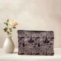 Detailed shot of cosmetic bag featuring vintage witch magical pattern design fabric utility pouch. - 02