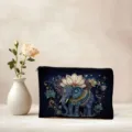 Detailed view of dark blue cosmetic storage pouch featuring ornate elephant and lotus mandala design. - 03 (Elephant)