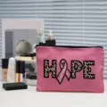 Roze canvas cosmetische tas met hope print en lint voor uw dagelijks gebruik thuis. - Zwart en Rood (02)