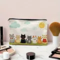 Close up view of the cute cartoon cat pattern canvas makeup pouch, showing fine details. - Cartoon Cat and Scenery Pattern / White