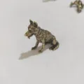Brass dog figurine close-up, small retro bronze animal statue for desktop tea pet decor - Military Dog