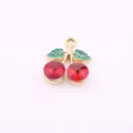 Detailed view of gold-plated red crystal cherry pendant, DIY jewelry making accessory. - Green Leaf Cherry
