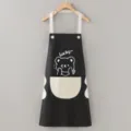 Detail view of black waterproof kitchen apron with cute bear print and large front pocket. - Black Bear Wipe Hand