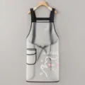 Delantal de cocina transparente e impermeable de TPU con bonito estampado de oso y bolsillo. - Blanco