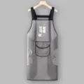 Vista detallada del delantal de cocina impermeable de TPU con toallas y bolsillo. - Regular Limpiar Manos Mantenerse Feliz