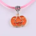 Halloween orange enamel pumpkin pendant necklace with pink cord for DIY jewelry making and crafting. - Pumpkin