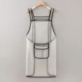 Close-up of transparent waterproof TPU apron with black trim and convenient front pocket design. - Regular With Pocket / White