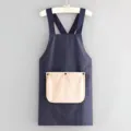 Delantal de cocina impermeable y antimanchas con bolsillo, diseño de espalda cruzada, azul. - Azul marino