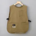 Khaki sleeveless work apron vest with multiple pockets and side buckles for daily use. - Khaki