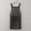 Waterproof TPU apron in dark grey, featuring a handy front pocket and comfortable shoulder straps. - Regular With Pocket / Black