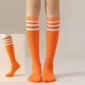 Orange knee high socks with white stripes, perfect for daily wear, JK uniform and parties. - One Size / Orange with White Stripes Calf Socks
