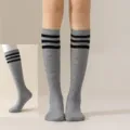 Grey knee-high socks for women, featuring classic three-stripe design, perfect for JK style. - One Size / Light Gray with Black Stripes Calf Socks
