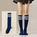 Detail view of Japanese style JK cosplay knee high socks featuring classic three stripes design. - One Size / Navy Blue with White Stripes Calf Socks