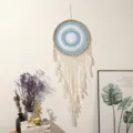 Handmade boho dream catcher wall hanging with white feathers and blue woven web for home decor. - Large Light Blue Dreamcatcher