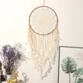 Large handmade bohemian dream catcher wall hanging with white feathers and delicate crochet net. - Large Beige Style C