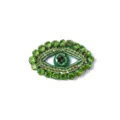 Gedetailleerde close-up van een handgemaakte groene kraal en strass oog patch DIY. - Groen