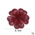 Close-up detail of sparkling red rhinestone flower accessory, brilliant crystal facets. - Dark Red