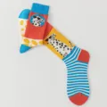 Detail view of asymmetric Dalmatian dog pattern jacquard crew socks with fun heart sunglasses. - One Size / Dalmatian Heart Glasses (Style 11)
