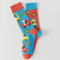 Detailed view of colorful cartoon dog driving pattern jacquard socks, stylish mid-calf socks. - One Size / Blue Red Patchwork Dog (Style 9)
