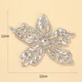 Detailed view of the silver rhinestone flower patch, sparkly crystal DIY clothing accessory. - Style 1