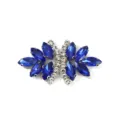 Close-up detail shot of sparkling blue and clear crystal rhinestone bow clothing accessory patch. - Style 17