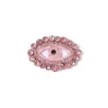 Close-up van de roze kristallen boze oog strass patch met fijne detailstructuur. - Roze